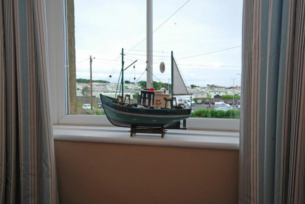 Apartamento Coastal Haven Seahouses Exterior foto